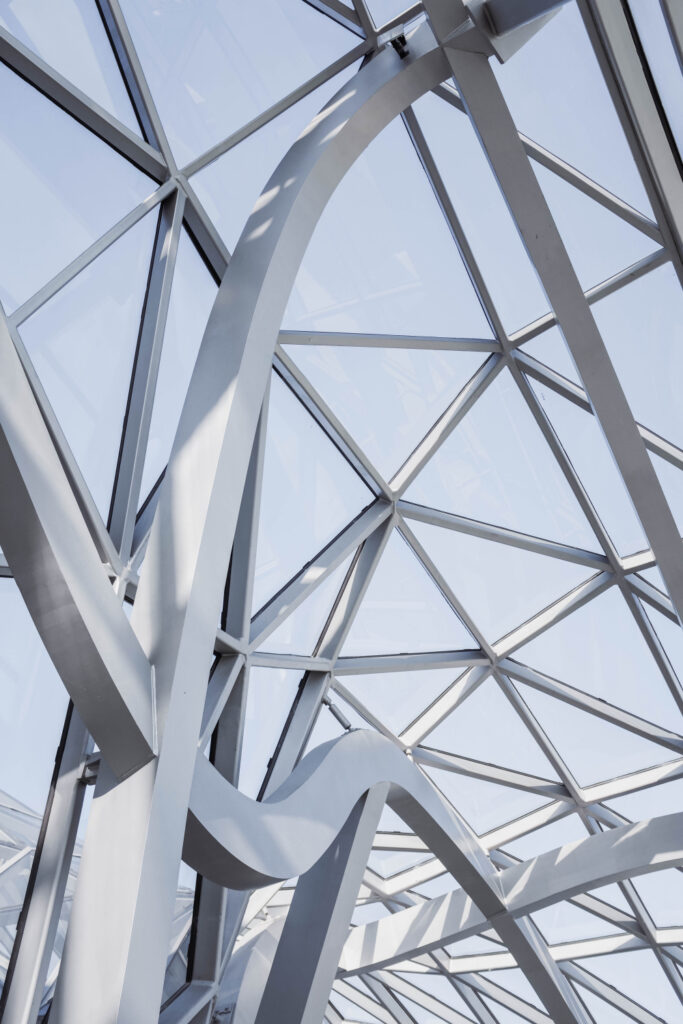 vertical-low-angle-shot-ceiling-white-geometrical-buildings